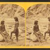 Types of Mojave Indians. [Two Mojave men pose on rocks in front of the river.]
