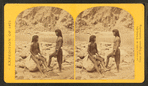 Types of Mojave Indians. [Two Mojave men pose on rocks in front of the river.]