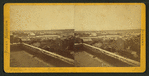 General view of a small town from the roof of a building.