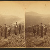 Scene on Bald Mountain? [Men on a mountain wearing packs, one holding a small dog.]