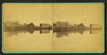 View of Anthony, Rhode Island, including buildings and a covered bridge, reflected in a river.