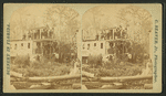 View of a steamboat moored at a river bank.