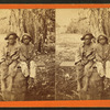 Happy little nig's. [Two boys sitting on a barrel in a field.]
