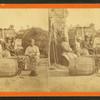 Little Bo-Peep. [Group of men and women seated outside, child peeking out of a barrel in the foreground.]