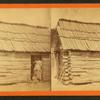 Happy little nig. [Woman and a small child in a cabin doorway.]