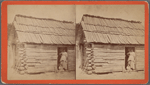 Happy little nig. [Woman and a small child in a cabin doorway.]