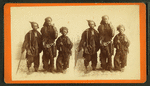 Studio portrait of three young chimney sweeps.