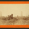 Battlefield of Peach Tree Creek, Ga. [View of railroad in ruins, factory visible in the background.]