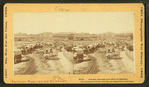 Atlanta, Georgia, just after its capture. [Covered wagons near the train depot.]