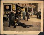 Sailors on street observe aftermath of clash between Chinese man and sailor.