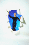Angela Lansbury wearing sequinned dress, holding a rose and apparently bursting through a paper wall