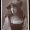 Publicity portrait of Loie Fuller in costume for the stage production Caprice by Alfred de Musset