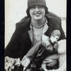 Gloria Christy with doll and stuffed monkey.