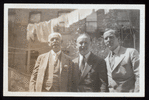 Dr. A. M. Wilson, Harry Houdini, and Dr. Shirley Quimby in Houdini's backyard