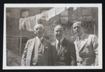 Dr. A. M. Wilson, Harry Houdini, and Dr. Shirley Quimby in Houdini's backyard