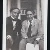 Harry Houdini and Howard Thurston sitting on a porch, possibly at Thurston's home in Beechhurst, Queens, N.Y.
