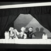 Puppet theater stage with three hand puppets