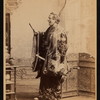 F. Federici as "the Mikado" in the D'Oyly Carte Opera Company stage production The Mikado