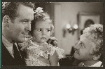 Dick Foran, unidentified actress, and Claude Rains in the motion picture Four Daughters
