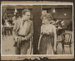 Scene from the 1916 silent film Reggie Mixes In