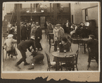Scene from the 1916 silent film Reggie Mixes In
