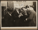 Scene from the 1916 silent film Reggie Mixes In