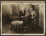 Scene from the 1916 silent film Reggie Mixes In