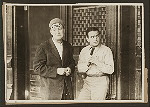 Scene from the 1916 silent film Reggie Mixes In