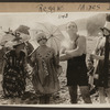 Scene from the 1916 silent film Reggie Mixes In