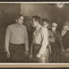 Scene from the 1916 silent film Reggie Mixes In