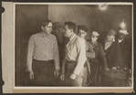 Scene from the 1916 silent film Reggie Mixes In
