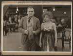 Scene from the 1916 silent film Reggie Mixes In