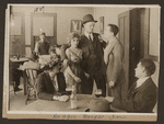 Scene from the 1916 silent film Reggie Mixes In
