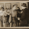 Scene from the 1916 silent film Reggie Mixes In