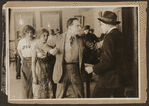 Scene from the 1916 silent film Reggie Mixes In