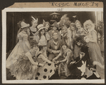 Scene from the 1916 silent film Reggie Mixes In