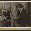 Scene from the 1916 silent film Reggie Mixes In