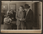 Scene from the 1916 silent film Reggie Mixes In