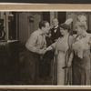 Scene from the 1916 silent film Reggie Mixes In