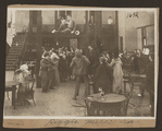 Scene from the 1916 silent film Reggie Mixes In