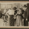 Scene from the 1916 silent film Reggie Mixes In