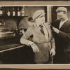 Scene from the 1916 silent film Reggie Mixes In