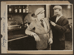 Scene from the 1916 silent film Reggie Mixes In