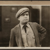 Scene from the 1916 silent film Reggie Mixes In
