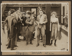 Scene from the 1916 silent film Reggie Mixes In