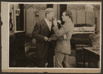 Scene from the 1916 silent film Reggie Mixes In