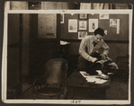 Scene from the 1916 silent film Reggie Mixes In