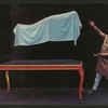 P. C. Sorcar levitating a body covered in a blue cloth above a table