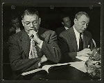 Oscar Hammerstein II and Richard Rodgers looking at script of South Pacific
