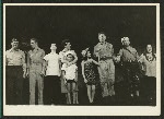 Harvey Stephens (Comdr. William Harbison), William Tabbert (Lt. Joseph Cable), Betta St. John (Liat), Mary Martin (Nellie Forbush), Michael De Leon (Jerome), Barbara Luna (Ngana), Ezio Pinza (Emile de Becque), Myron McCormick (Luther Billis) and Juanita Hall (Bloody Mary) at curtain call for South Pacific